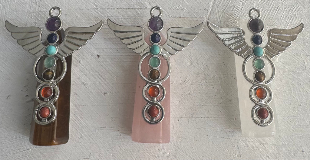 Símbolo Caduceo con cuarzos