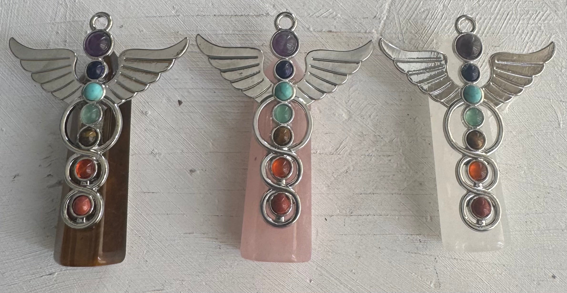 Símbolo Caduceo con cuarzos