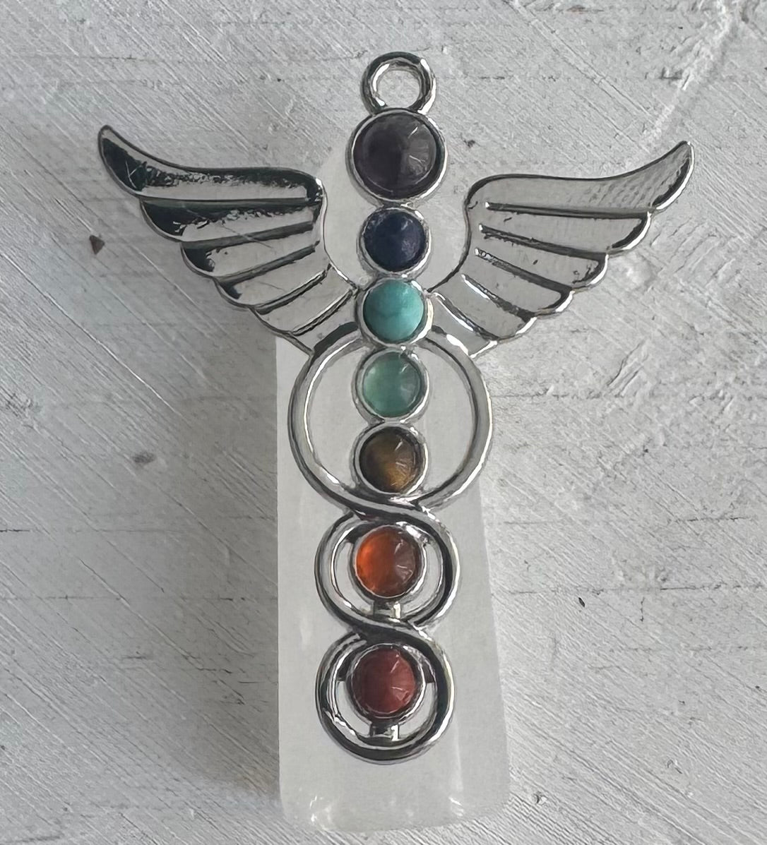 Símbolo Caduceo con cuarzos