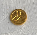Conjunto de Moneda con el símbolo de Triqueta